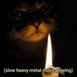 evil-looking-cat-in-the-dark-with-its-face-lit-up-by-a-single-candle-slow-heavy-metal-music-p...jpeg